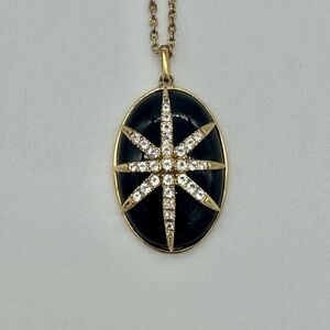 Pre-owned ELIZABETH and JAMES Gold Tone Starburst Pendant Necklace